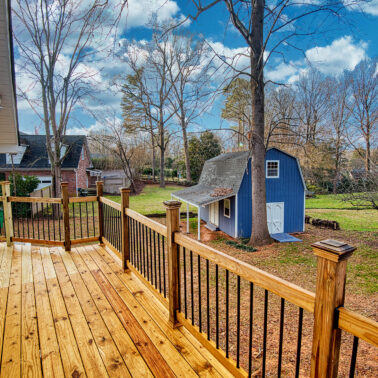 Porch addition with large windows in a remodeled Charlotte home