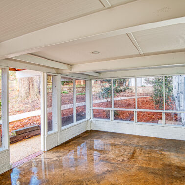 Back Porch addition with large windows in a remodeled Charlotte home