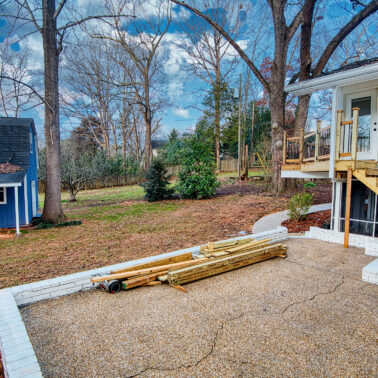 Sunroom addition with large windows in a remodeled Charlotte home